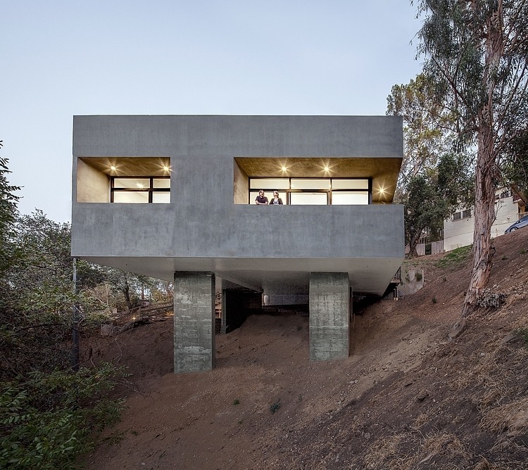 Exposed Concrete, Balcony, Hillside House with a Rooftop Carport